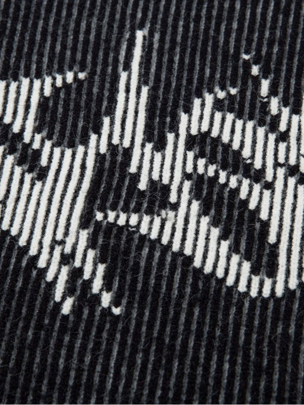Haaura Symbol-Intarsia Turtleneck Sweater