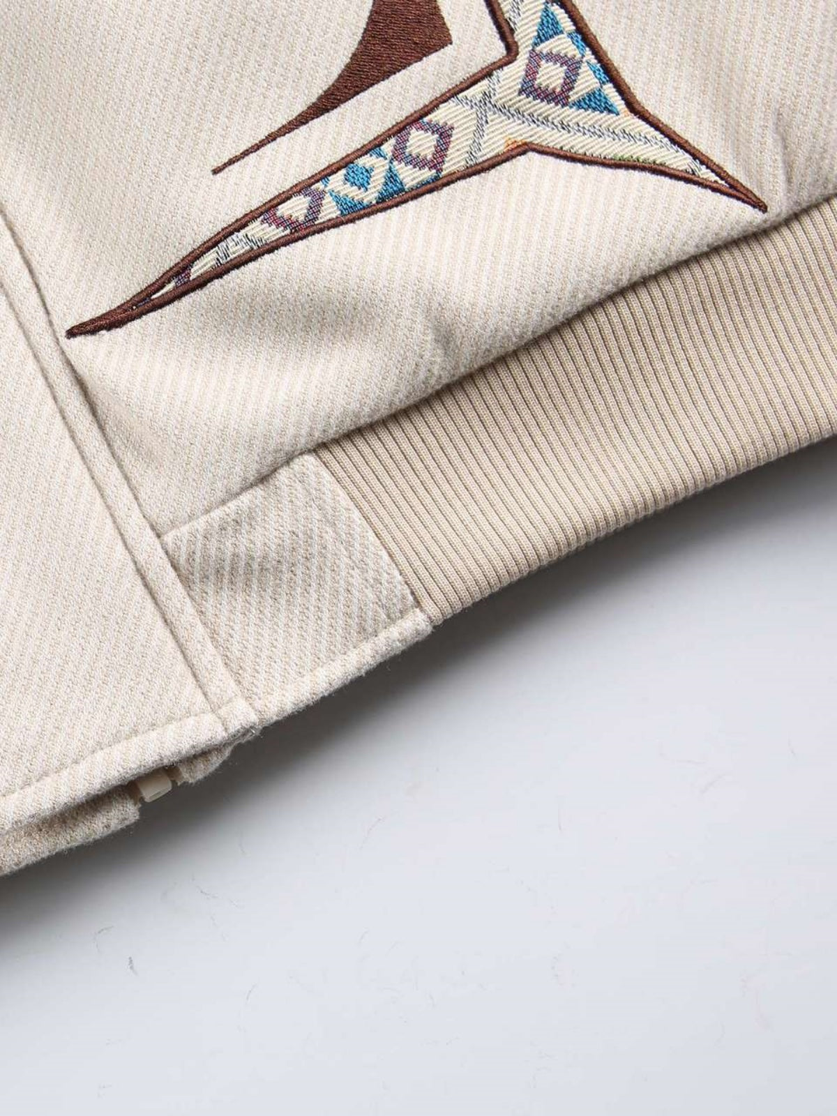 Haaura Geometric Embroidered Zip Up Jacket